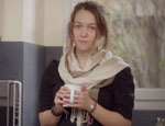 An image of Océane holding a mug.