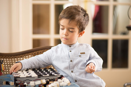 An image of Filip playing with legos.