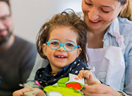 An image of a child laughing.