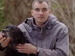 An image of Geoffray with his dog.