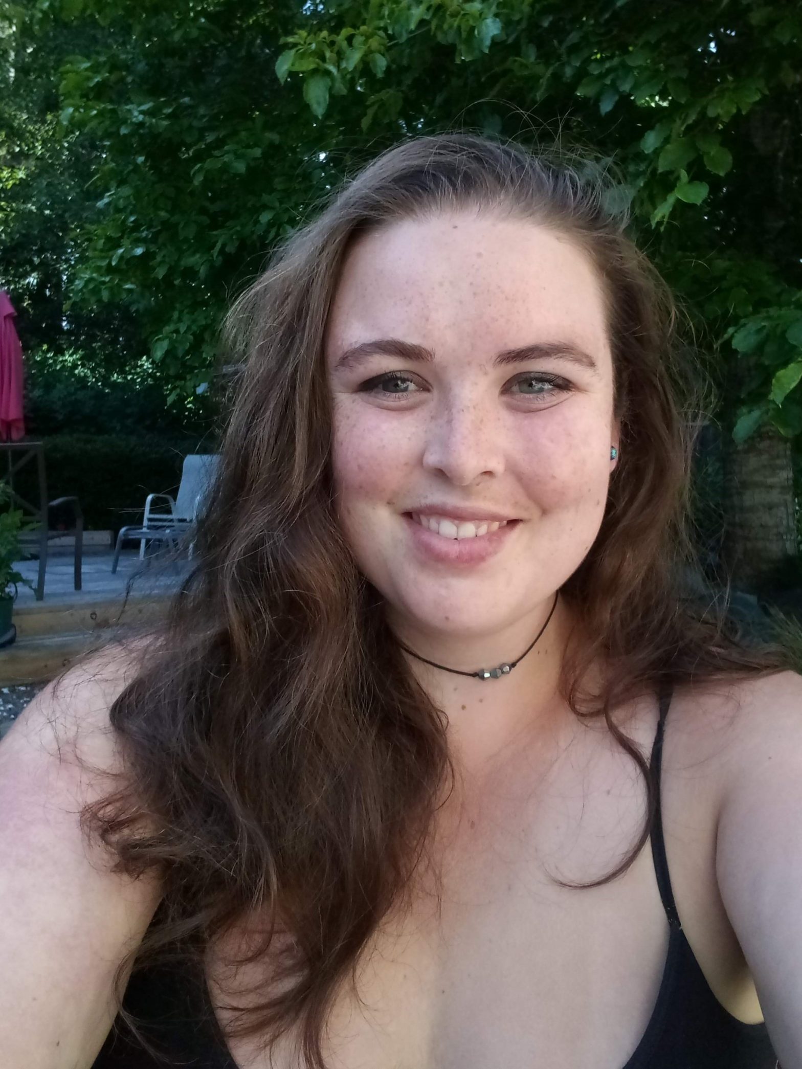 A selfie of Katie, smiling.